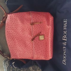 Pink brand new Dooney and Burke purse